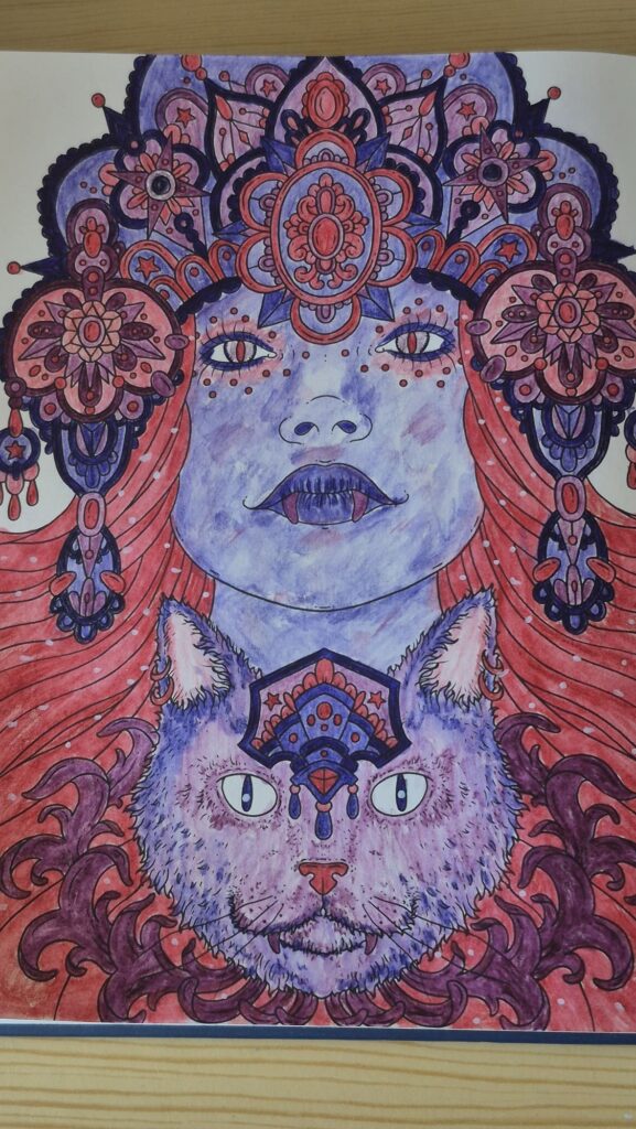 Vampirin mit Vampirkatze in analogen Farben